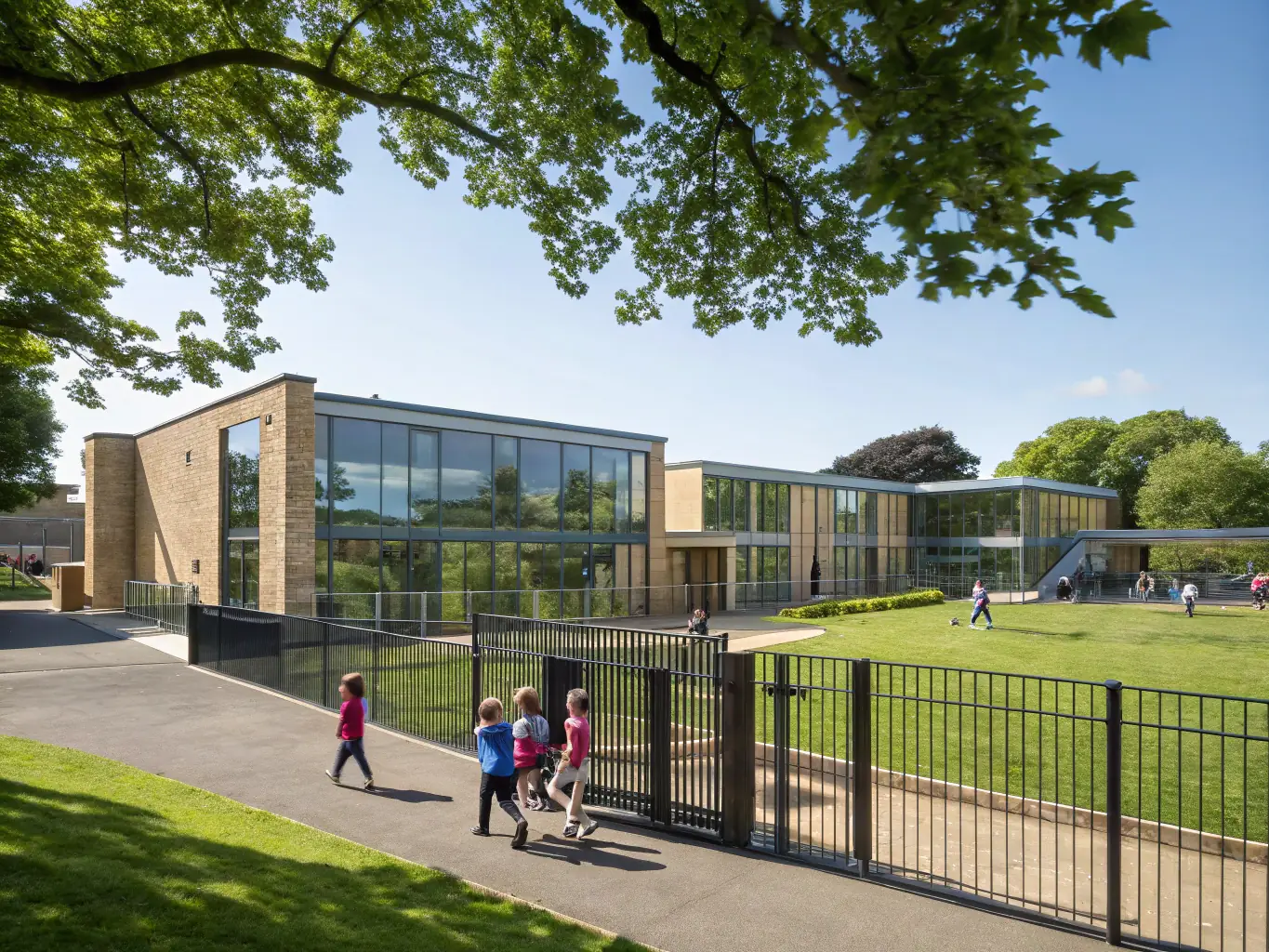 A photograph of the school's administration building during a sunny day, with the school's name prominently displayed. The image should convey a sense of professionalism and welcome.